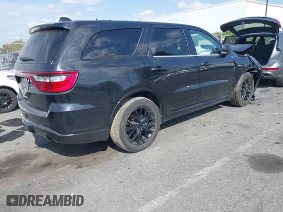 2015 Dodge Durango R/T with VIN 1C4SDJCT9FC688533, listed as a IAAI auction lot 43307094 with Not provided miles and . Bid and sale history available at DreamBid. Image 4.