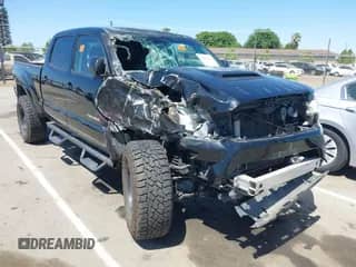 2014 Toyota Tacoma PreRunner with VIN 3TMKU4HN6EM041841, listed as a IAAI auction lot 42082629 with Not provided miles and . Bid and sale history available at DreamBid. Image 1.