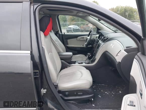 2011 Chevrolet Traverse LTZ z VIN 1GNKVLEDXBJ144490, wystawiony jako IAAI lot #43288275 z przebiegiem Nie podano mil oraz . Historia ofert i sprzedaży dostępna na DreamBid. Obrazek 5.