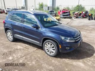 2014 Volkswagen Tiguan SEL with VIN WVGAV3AX8EW559119, listed as a IAAI auction lot 43106197 with 126,106 mi miles and . Bid and sale history available at DreamBid. Image 1.
