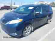 2011 Toyota Sienna LE with VIN 5TDKK3DCXBS117125, listed as a IAAI auction lot 42218382 with 232,320 mi miles and . Bid and sale history available at DreamBid. Image 2.