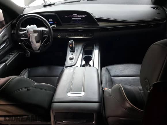 2021 Cadillac Escalade Sport с VIN 1GYS4FKLXMR287205, выставлен на аукционе Copart как лот 64469335 с пробегом 70 163 миль миль и Списание • Salvage title. История ставок и продаж доступна на DreamBid. Изображение 8.