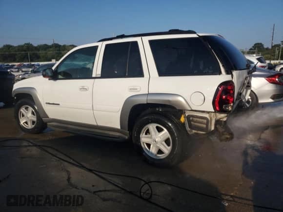 2003 Chevrolet TrailBlazer LT с VIN 1GNDT13SX32359741, выставлен на аукционе Copart как лот 69097455 с пробегом 166 341 миль миль и На запчасти • Non repairable. История ставок и продаж доступна на DreamBid. Изображение 2.