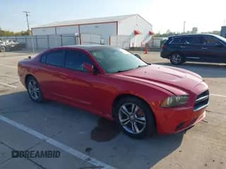 2011 Dodge Charger RT Max with VIN 2B3CM5CT9BH572463, listed as a IAAI auction lot 43240428 with 141,870 mi miles and . Bid and sale history available at DreamBid. Image 1.