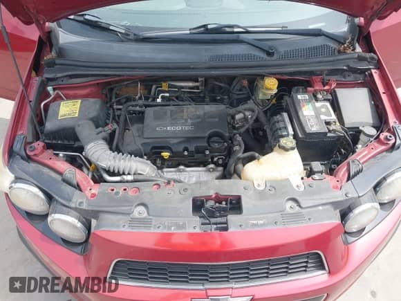 2012 Chevrolet Sonic LT z VIN 1G1JC6SB2C4213759, wystawiony jako IAAI lot #43028832 z przebiegiem 90 033 mil mil oraz . Historia ofert i sprzedaży dostępna na DreamBid. Obrazek 10.