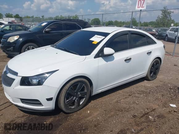 2014 Chevrolet Cruze Diesel with VIN 1G1P75SZ6E7456434, listed as a IAAI auction lot 42960893 with 142,234 mi miles and . Bid and sale history available at DreamBid. Image 2.