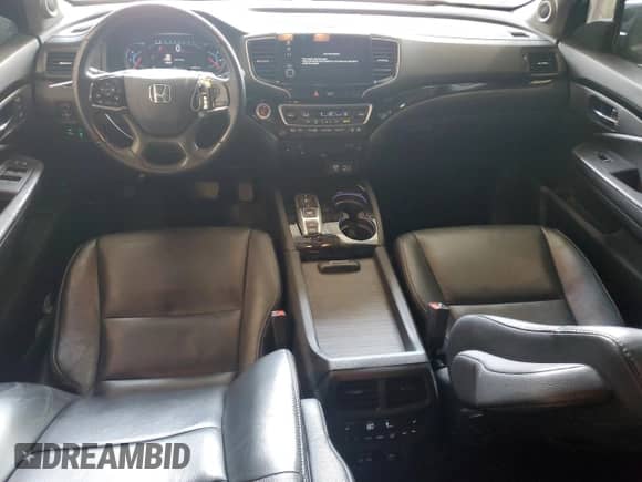 2020 Honda Pilot Touring 8-Passenger z VIN 5FNYF6H95LB058179, wystawiony jako Copart lot #67393775 z przebiegiem 120 055 mil mil oraz Szkoda całkowita • Salvage title. Historia ofert i sprzedaży dostępna na DreamBid. Obrazek 8.