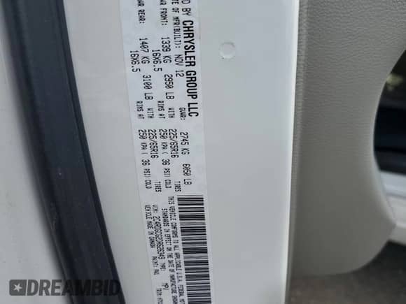 2013 Dodge Grand Caravan SXT with VIN 2C4RDGCG2DR626349, listed as a Copart auction lot 84200345 with 221,391 mi miles and Salvage title. Bid and sale history available at DreamBid. Image 13.