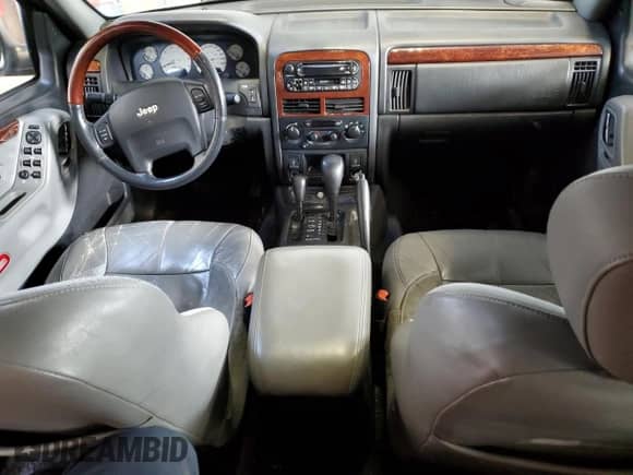 2003 Jeep Grand Cherokee Overland с VIN 1J8GW68J63C616424, выставлен на аукционе Copart как лот 69949265 с пробегом Не указан миль и Списание • Salvage title. История ставок и продаж доступна на DreamBid. Изображение 8.