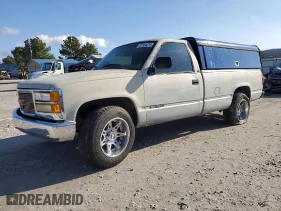 1994 GMC Sierra 1500 z VIN 1GTEC14H2RE555468, wystawiony jako Copart lot #63652015 z przebiegiem 195 188 mil mil oraz Szkoda całkowita • Salvage title. Historia ofert i sprzedaży dostępna na DreamBid. Obrazek 1.