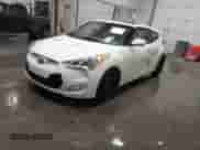 2012 Hyundai Veloster w/Black Int z VIN KMHTC6AD2CU064171, wystawiony jako IAAI lot #41841873 z przebiegiem 192 670 mil mil oraz . Historia ofert i sprzedaży dostępna na DreamBid. Obrazek 2.