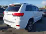 2015 Jeep Grand Cherokee Overland z VIN 1C4RJECG6FC848840, wystawiony jako IAAI lot #43513815 z przebiegiem 92 993 mil mil oraz . Historia ofert i sprzedaży dostępna na DreamBid. Obrazek 4.
