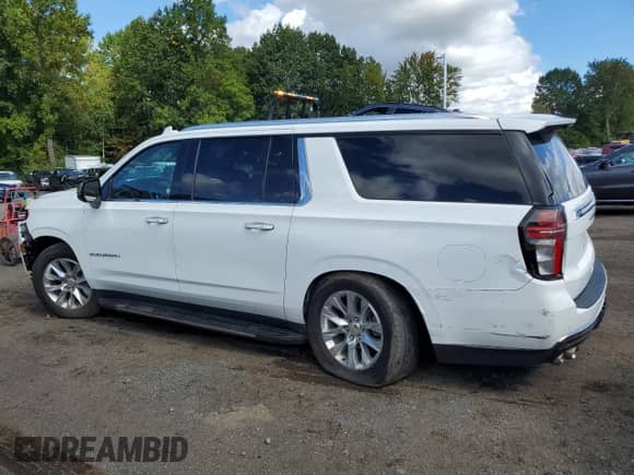 2023 Chevrolet Suburban Premier with VIN 1GNSCFKD2PR392978, listed as a Copart auction lot 84419315 with 61,778 mi miles and Clean title. Bid and sale history available at DreamBid. Image 2.