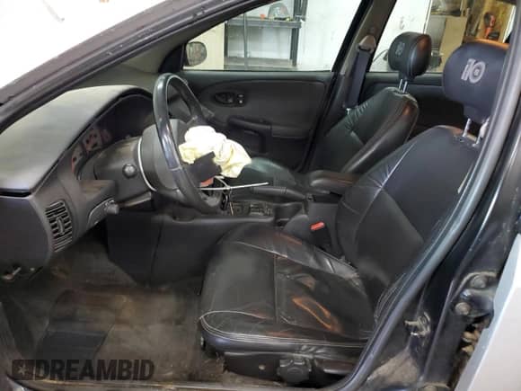 2001 Saturn SL with VIN 1G8ZK54791Z298951, listed as a Copart auction lot 89198795 with 157,208 mi miles and Salvage title. Bid and sale history available at DreamBid. Image 7.