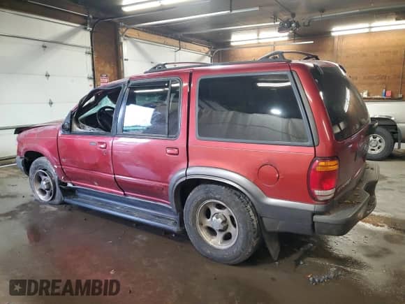 1999 Ford Explorer XLT z VIN 1FMZU34E0XUC18649, wystawiony jako Copart lot #83829905 z przebiegiem Nie podano mil oraz Szkoda całkowita • Salvage title. Historia ofert i sprzedaży dostępna na DreamBid. Obrazek 2.