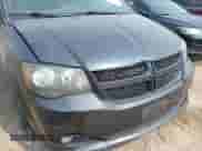 2014 Dodge Grand Caravan SXT with VIN 2C4RDGCG1ER463209, listed as a IAAI auction lot 42403781 with 79,387 mi miles and . Bid and sale history available at DreamBid. Image 17.
