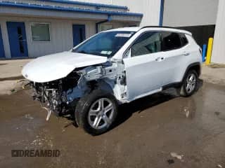 2023 Jeep Compass Latitude with VIN 3C4NJDBN5PT548057, listed as a Copart auction lot 84168215 with 28,565 mi miles and Salvage title. Bid and sale history available at DreamBid. Image 1.