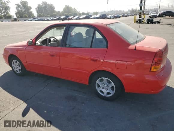 2005 Hyundai Accent GLS с VIN KMHCG45C55U593854, выставлен на аукционе Copart как лот 72237914 с пробегом 83 203 миль миль и Чистый • Clean title. История ставок и продаж доступна на DreamBid. Изображение 2.