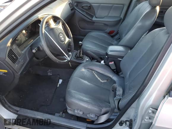 2004 Hyundai Elantra GT z VIN KMHDN56D64U107770, wystawiony jako Copart lot #84436064 z przebiegiem 285 779 mil mil oraz Szkoda całkowita • Salvage title. Historia ofert i sprzedaży dostępna na DreamBid. Obrazek 7.