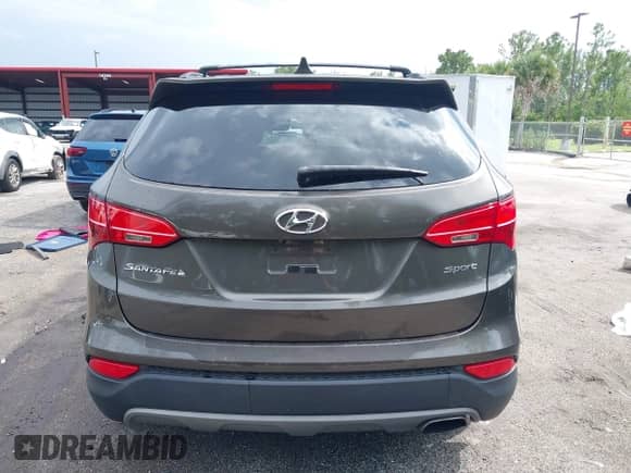 2014 Hyundai Santa Fe with VIN 5XYZU3LB0EG217513, listed as a IAAI auction lot 43183935 with Not provided miles and . Bid and sale history available at DreamBid. Image 15.