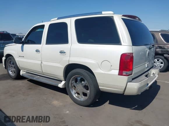 2004 Cadillac Escalade with VIN 1GYEC63TX4R193940, listed as a IAAI auction lot 42482732 with 280,833 mi miles and . Bid and sale history available at DreamBid. Image 3.