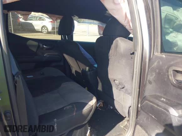 2020 Toyota Tacoma SR5 with VIN 3TMDZ5BNXLM084553, listed as a IAAI auction lot 42556448 with 74,634 mi miles and . Bid and sale history available at DreamBid. Image 8.