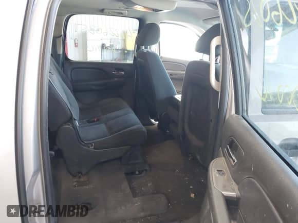 2007 Chevrolet Suburban LT z VIN 1GNFK16377J303817, wystawiony jako IAAI lot #42226025 z przebiegiem 233 167 mil mil oraz . Historia ofert i sprzedaży dostępna na DreamBid. Obrazek 8.