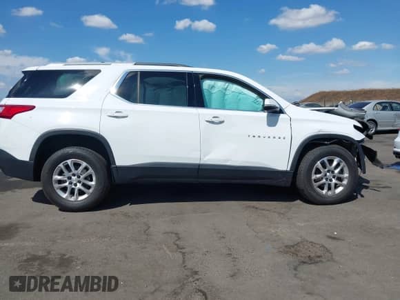 2018 Chevrolet Traverse LT Cloth z VIN 1GNEVGKW0JJ266512, wystawiony jako IAAI lot #43200304 z przebiegiem 101 892 mil mil oraz . Historia ofert i sprzedaży dostępna na DreamBid. Obrazek 14.
