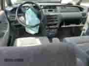 1996 Honda Odyssey z VIN JHMRA1840TC015701, wystawiony jako Copart lot #60103885 z przebiegiem 158 416 mil mil oraz Szkoda całkowita • Salvage title. Historia ofert i sprzedaży dostępna na DreamBid. Obrazek 8.