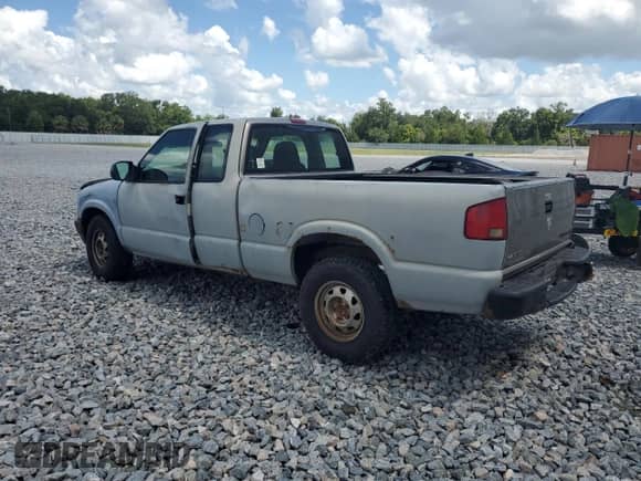 2003 Chevrolet S-10 LS с VIN 1GCDT19X038215432, выставлен на аукционе Copart как лот 61661165 с пробегом 219 435 миль миль и Списание • Salvage title. История ставок и продаж доступна на DreamBid. Изображение 2.