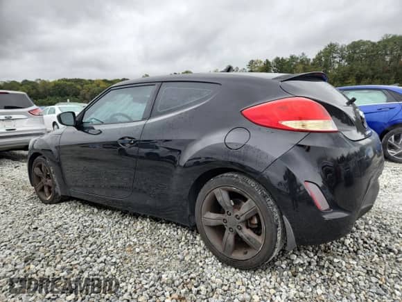 2013 Hyundai Veloster w/Gray Int z VIN KMHTC6AD6DU151914, wystawiony jako Copart lot #90408325 z przebiegiem 95 258 mil mil oraz Czysty tytuł • Clean title. Historia ofert i sprzedaży dostępna na DreamBid. Obrazek 2.