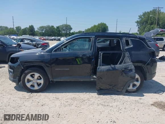 2020 Jeep Compass Latitude z VIN 3C4NJCBB7LT141612, wystawiony jako IAAI lot #42935872 z przebiegiem 100 557 mil mil oraz . Historia ofert i sprzedaży dostępna na DreamBid. Obrazek 14.