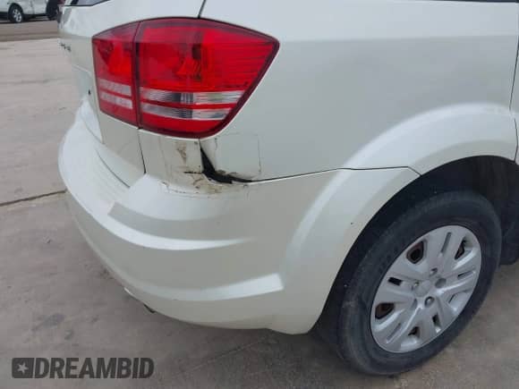 2014 Dodge Journey American Value with VIN 3C4PDCABXET101139, listed as a IAAI auction lot 42623417 with 151,744 mi miles and . Bid and sale history available at DreamBid. Image 19.