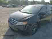 2012 Honda Odyssey LX z VIN 5FNRL5H23CB114839, wystawiony jako Copart lot #57137305 z przebiegiem 205 439 mil mil oraz Szkoda całkowita • Salvage title. Historia ofert i sprzedaży dostępna na DreamBid. Obrazek 14.