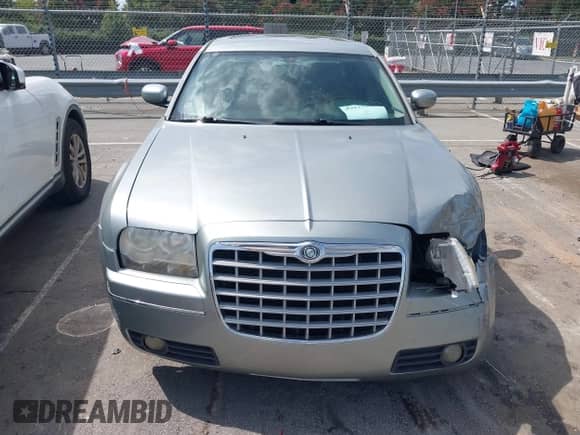 2005 Chrysler 300 Touring с VIN 2C3AA53GX5H512654, выставлен на аукционе IAAI как лот 43112900 с пробегом 227 996 миль миль и . История ставок и продаж доступна на DreamBid. Изображение 12.