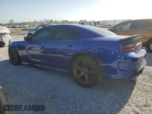 2019 Dodge Charger Scat Pack с VIN 2C3CDXGJ1KH740166, выставлен на аукционе Copart как лот 54598135 с пробегом 82 246 миль миль и Списание • Salvage title. История ставок и продаж доступна на DreamBid. Изображение 2.