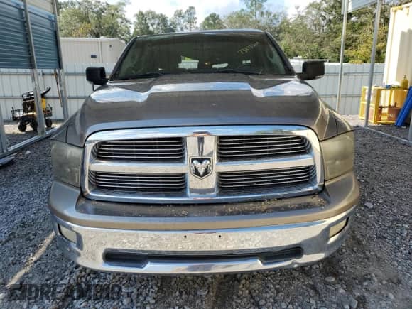 2009 Dodge 1500 SLT with VIN 1D3HB13T09S736549, listed as a Copart auction lot 73873824 with 176,610 mi miles and Salvage title. Bid and sale history available at DreamBid. Image 5.