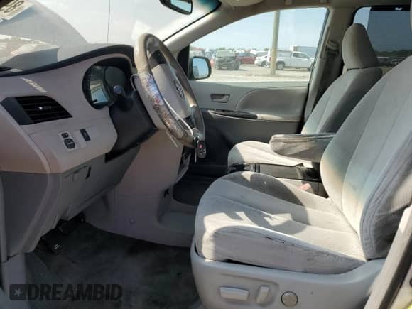 2012 Toyota Sienna LE with VIN 5TDKK3DC1CS276911, listed as a Copart auction lot 89585945 with 209,475 mi miles and Clean title. Bid and sale history available at DreamBid. Image 7.