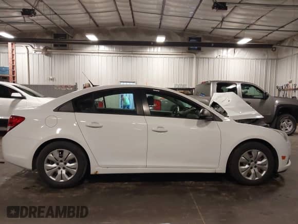 2014 Chevrolet Cruze LS with VIN 1G1PB5SH7E7143110, listed as a IAAI auction lot 42486209 with 92,277 mi miles and . Bid and sale history available at DreamBid. Image 14.
