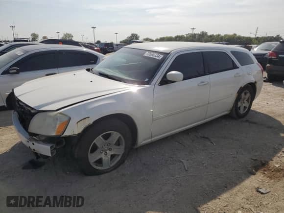 2007 Dodge Magnum with VIN 2D4FV47V77H776624, listed as a Copart auction lot 70665334 with 211,212 mi miles and Salvage title. Bid and sale history available at DreamBid. Image 1.
