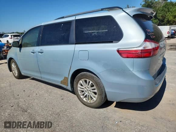 2016 Toyota Sienna XLE with VIN 5TDYK3DC1GS719400, listed as a Copart auction lot 86728185 with 169,560 mi miles and Clean title. Bid and sale history available at DreamBid. Image 2.