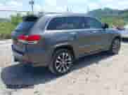 2017 Jeep Grand Cherokee Overland with VIN 1C4RJFCG0HC778681, listed as a IAAI auction lot 42573123 with 83,616 mi miles and . Bid and sale history available at DreamBid. Image 4.