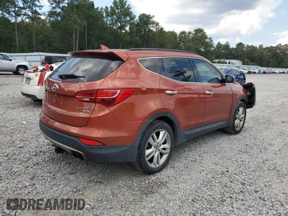 2013 Hyundai Santa Fe Sport с VIN 5XYZUDLA6DG109974, выставлен на аукционе Copart как лот 71775585 с пробегом 149 398 миль миль и Списание • Salvage title. История ставок и продаж доступна на DreamBid. Изображение 3.