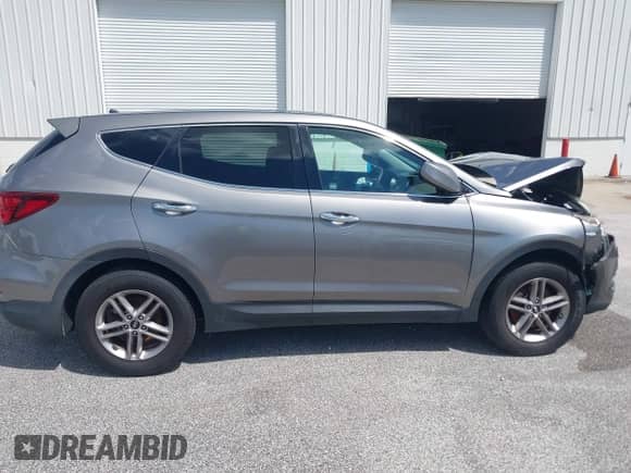 2018 Hyundai Santa Fe 2.4L with VIN 5NMZT3LB0JH053313, listed as a IAAI auction lot 42992926 with 140,803 mi miles and . Bid and sale history available at DreamBid. Image 13.