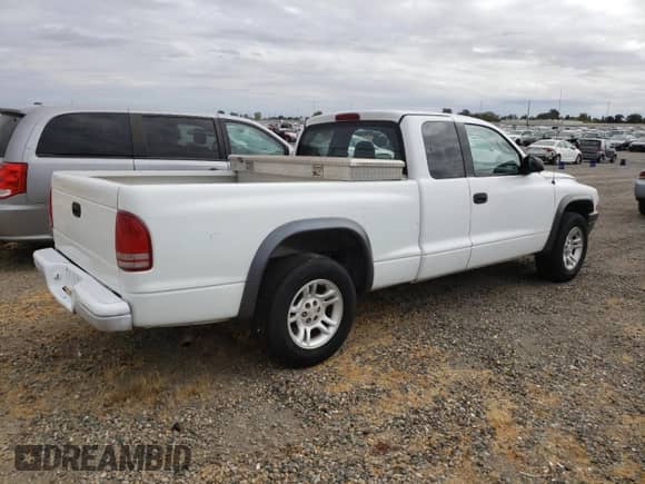 2002 Dodge Dakota с VIN 1B7GL12X82S692926, выставлен на аукционе Copart как лот 84073435 с пробегом 149 095 миль миль и Чистый • Clean title. История ставок и продаж доступна на DreamBid. Изображение 3.