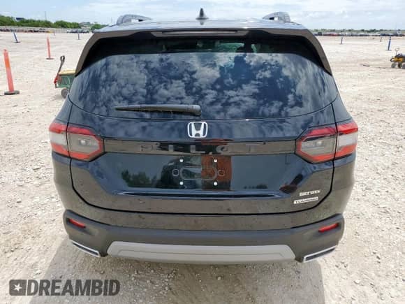 2025 Honda Pilot Touring с VIN 5FNYG2H70SB016778, выставлен на аукционе Copart как лот 60674115 с пробегом 5 294 миль миль и Списание • Salvage title. История ставок и продаж доступна на DreamBid. Изображение 6.