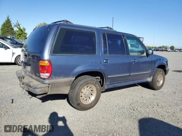2000 Ford Explorer XLS with VIN 1FMZU72X6YZA15989, listed as a Copart auction lot 81274445 with 143,417 mi miles and Salvage title. Bid and sale history available at DreamBid. Image 3.