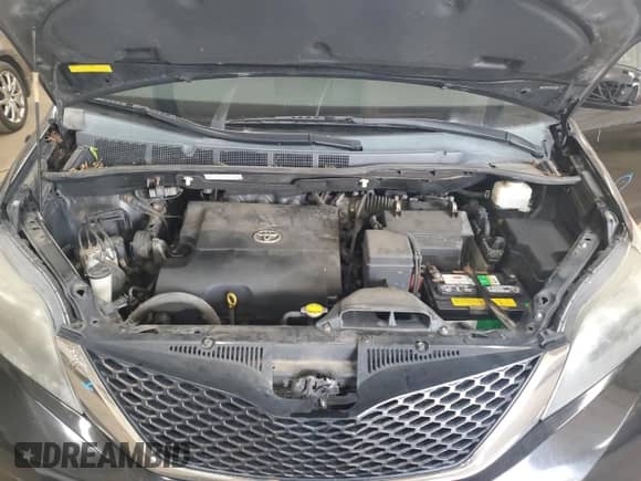 2011 Toyota Sienna SE with VIN 5TDXK3DCXBS110665, listed as a Copart auction lot 84588025 with 317,691 mi miles and Salvage title. Bid and sale history available at DreamBid. Image 12.
