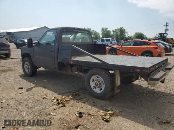 1996 Chevrolet Silverado 2500 с VIN 1GCGK24R5TE237782, выставлен на аукционе Copart как лот 62363975 с пробегом 193 992 миль миль и Чистый • Clean title. История ставок и продаж доступна на DreamBid. Изображение 2.