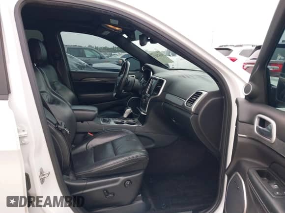 2016 Jeep Grand Cherokee SRT with VIN 1C4RJFDJ0GC456325, listed as a IAAI auction lot 41425211 with 159,746 mi miles and . Bid and sale history available at DreamBid. Image 5.